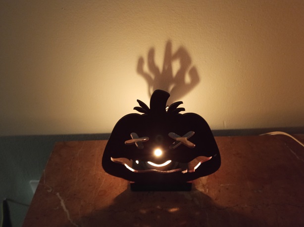 Portavelas sombras Halloween calabaza mano zombi