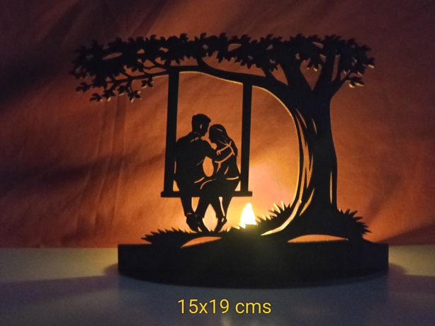 Portavelas enamorados columpio